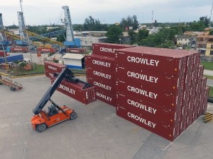 https://www.ajot.com/images/uploads/article/Crowley-Logistics-Containers-Puerto-Cortes.jpg