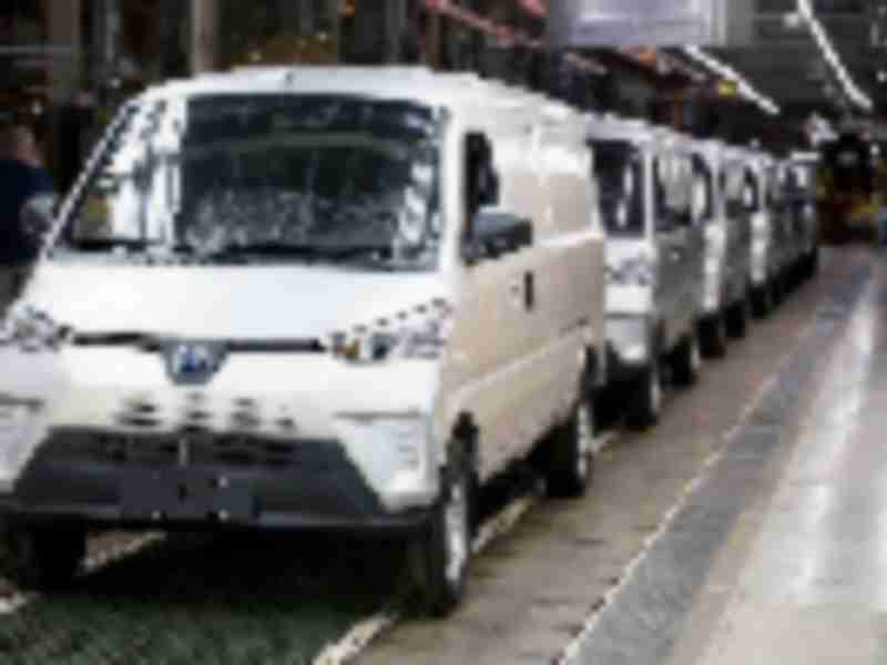 Electric vans roll off line that once made gas-guzzling Hummers