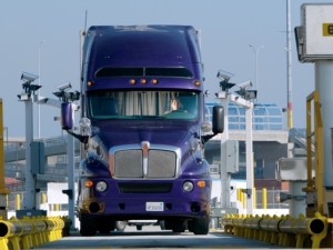 https://www.ajot.com/images/uploads/article/201101_Truck_entering_APM_Terminals_Pier_400_gate_and_scale_1.jpg