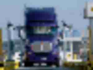 https://www.ajot.com/images/uploads/article/201101_Truck_entering_APM_Terminals_Pier_400_gate_and_scale_1.jpg