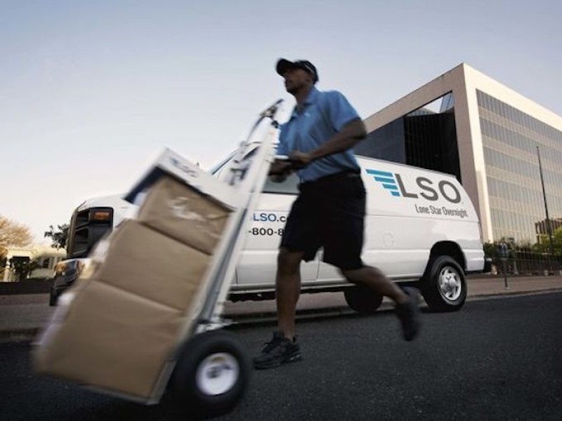 FedEx, UPS turn record holiday surge into someone else’s problem