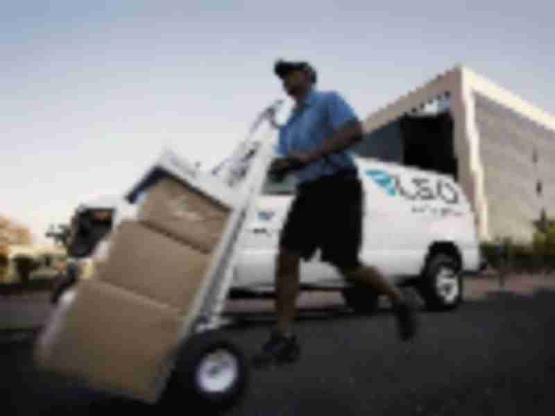 FedEx, UPS turn record holiday surge into someone else’s problem