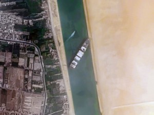 https://www.ajot.com/images/uploads/article/Container_Ship_Ever_Given_stuck_in_the_Suez_Canal_Egypt_-_March_24th%2C_2021.jpg