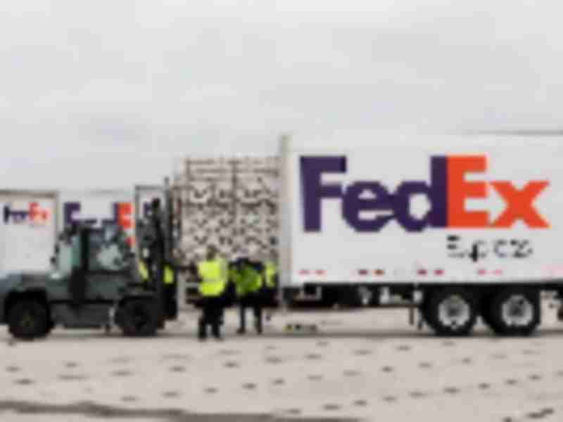 FedEx wins over Wall Street with $6 billion cuts, gains on UPS