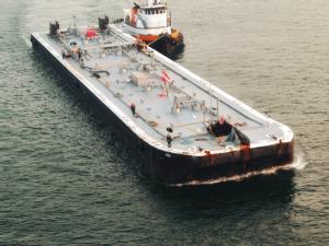 https://www.ajot.com/images/uploads/article/Fueling-Ship_Barge.png
