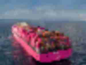 https://www.ajot.com/images/uploads/article/ONE-Columba-vessel-going-to-sea.jpg