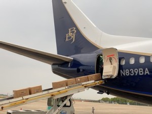 https://www.ajot.com/images/uploads/article/Plane_being_loaded_in_China__002_Boeing.jpg