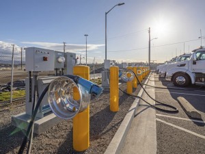 https://www.ajot.com/images/uploads/article/Port_of_Oakland_electric_truck_chargers.jpg