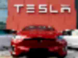 https://www.ajot.com/images/uploads/article/Tesla_Forbes.jpeg