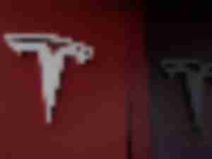 https://www.ajot.com/images/uploads/article/Tesla_logo.jpg
