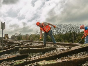 https://www.ajot.com/images/uploads/article/Union_Pacific_Rail_employee__Rail_Ties.jpg