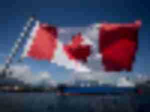 https://www.ajot.com/images/uploads/article/canada-flag-containership.jpg