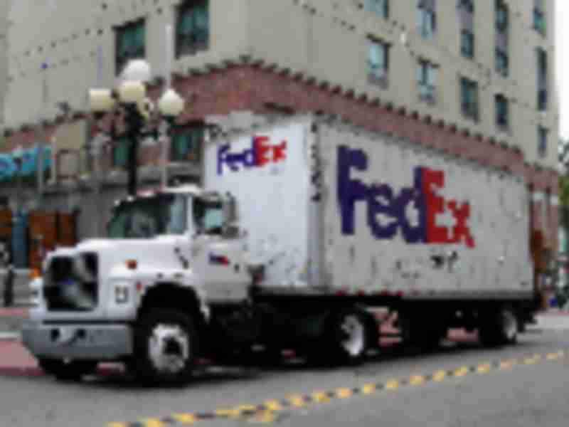 FedEx’s Smith Sees Blockchain as `Next Frontier’ for Logistics