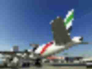 https://www.ajot.com/images/uploads/article/khalif-sat-emirates-plane.jpg