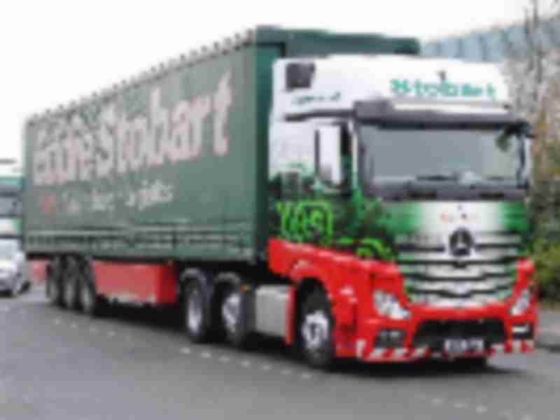 U.K. trucker ousts CEO, halts trading in new blow to Woodford