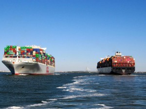 https://www.ajot.com/images/uploads/article/two-14k-TEU-ships-passing-in-Charleston-harbor.jpg