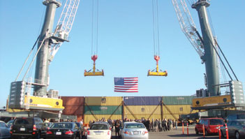 Dignitaries gathered between two cranes at the Stockton Marine Highway ceremony.