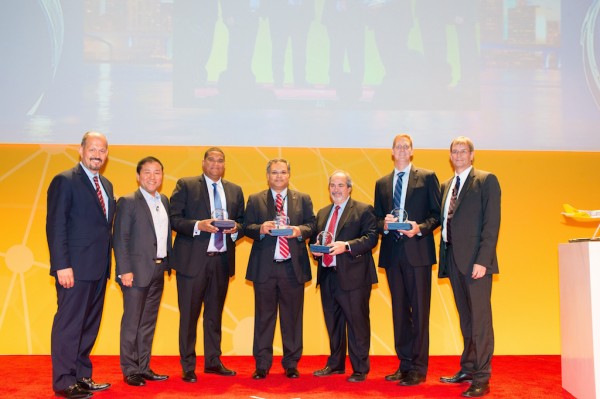 From left to right: Angelos Orfanos, President, Life Sciences & Healthcare Sector, DHL Customer Solutions & Innovation and David Bang, Global Head of DHL Temperature Management Solutions/CEO LifeConEx at DHL Global Forwarding pose along with the first DHL CARE Award recipients.