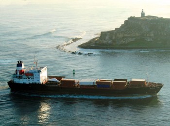 National Shipping of America’s M/V National Glory enters San Juan’s harbor with cargo including air passenger boarding bridges, at middeck. 