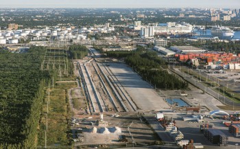 Florida East Coast Railway’s 43-acre intermodal container transfer facility is taking shape near Port Everglades berths. 