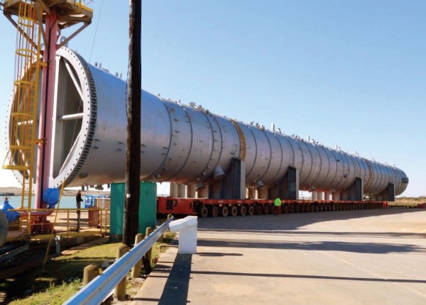 A 1,270-ton, 305-foot-long, 30-foot-diameter ethylene fractionator destined for a nearby Formosa Plastics Corp. plant crosses Calhoun Port Authority docks 