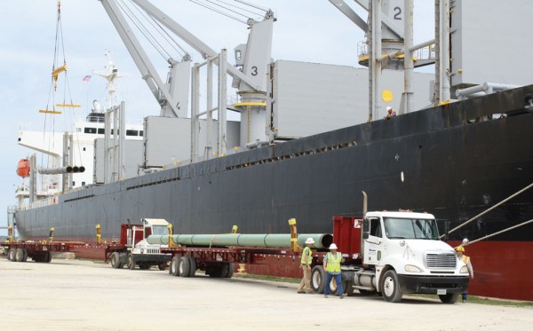 Long sections of coated pipe from Greece are offloaded at the Jackson County Port Authority’s Port of Pascagoula on the Mississippi Gulf Coast.