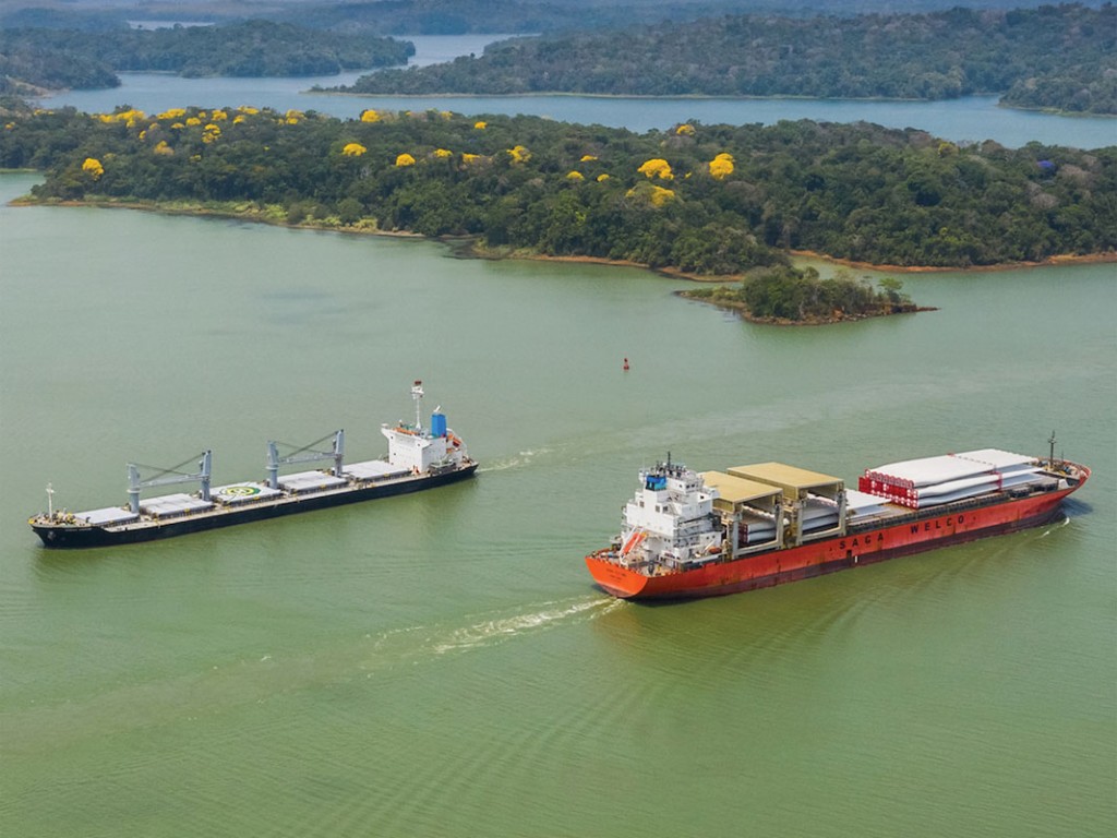 Two ships pass each other in the Panama Canal.