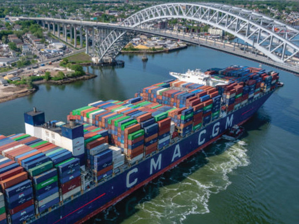 The CMA CGM Marco Polo, the largest vessel ever to call at the port, passes under the Bayonne Bridge.