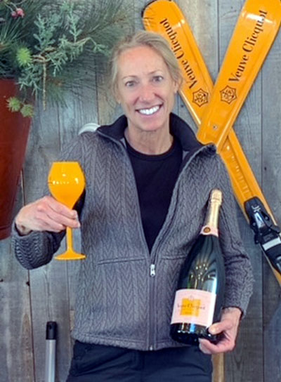 An avid skier with a bubbly personality, Alison Leavitt, managing director of the Wine and Spirits Shippers Association Inc., enjoys a glass of fine champagne after a day on the slopes. (Photo special for AJOT)