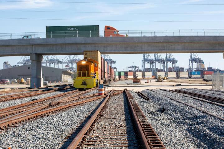 The first CSX rail cars travel under the S.R. 25 overpass on newly installed track linking Garden City Terminal’s Chatham and Mason Mega Rail yards. The Mason Mega Rail project is now more than 75 percent complete.