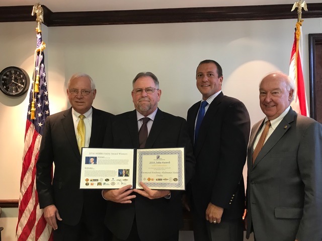  The Alabama State Port Authority’s Terminal Railway – Alabama State Docks (TASD) received the prestigious 2016 President’s Award from the American Short Line and Regional Railroad Association during the association’s regional meeting held September 26, 2017, in Charleston, SC. Pictured L-R: Jimmy Lyons, director and chief executive officer of the Alabama State Port Authority; Mike Russell, general manager (retired), Terminal Railway (TASD); Cliff Melton, general manager, Terminal Railway (TASD); and Horace Horn, chairman of the board, Alabama State Port Authority. 
