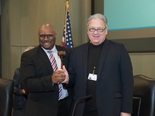 Arnold B. Baker (left), Chairman of the Board of Commissioners of the Port of New Orleans, poses with Laney J. Chouest (right), Past-Chairman of the Board.