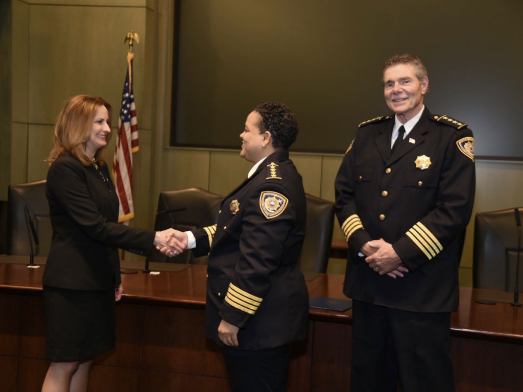 Port NOLA President and CEO Brandy D. Christian swears in Chief Montroll alongside outgoing Chief Hecker.