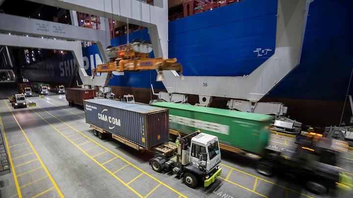 Crews work the COSCO Rose at the Port of Savannah's Garden City Terminal. The terminal handled 4.44 million twenty-foot equivalent container units in FY2020