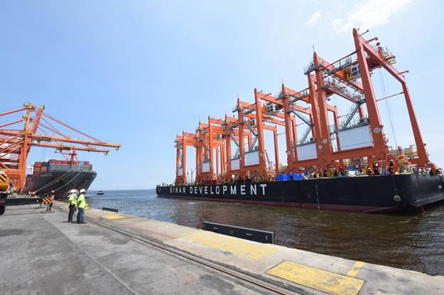 the arrival of eight new hybrid rubber tired gantries at MICT’s Berth 5 last 5 July.