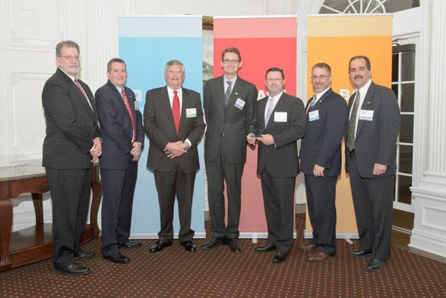 KLLM receives BASF Truckload Packaged Carrier of the Year Award. Pictured (L to R): Grant Pridmore and Tom Gause of BASF, Tony Reynolds of KLLM, Fried-Walter Muenstermann of BASF, Jim Richards of KLLM, Charles (Chuck) Schmidt and Peter Belthoff of BASF. (PRNewsFoto/KLLM Transport)