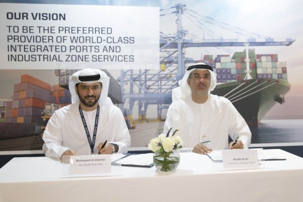 Khalifa Al Ali with Captain Mohamed Juma Al Shamisi during the signing