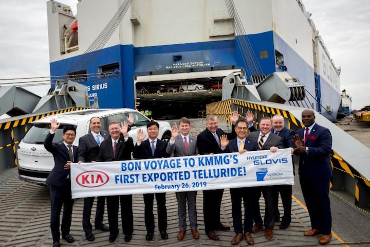 Representatives from Kia Motors Manufacturing Georgia, the Georgia Ports Authority, the Georgia Department of Economic Development, the International Longshoremen's Association and the shipping line Glovis send off one of the first Kia Tellurides to be exported via the Port of Brunswick on the ramp of the roll-on/roll-off vessel Sirius, Tuesday Feb. 26, 2019, at Colonel's Island Terminal in Brunswick, Ga. Kia Motors Manufacturing Georgia plans to ship approximately 3,000 Tellurides per year to global markets.