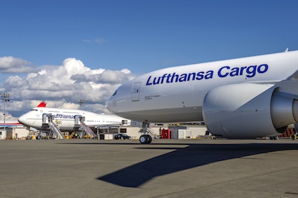 Lufthansa Cargo Boeing 777F DALFD: A perfect couple in Everett/Washington on the apron of the Boeing Everett Factory: The D-ALFD standing in front of a brand-new Boeing 747-8 of Lufthansa Passenger Airlines.