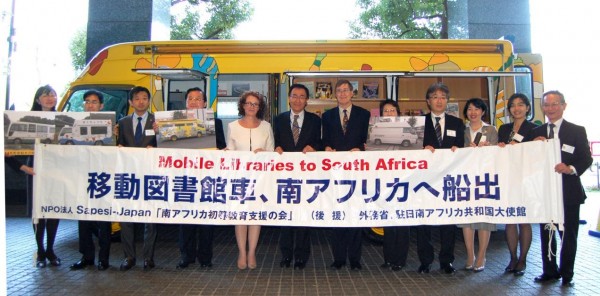 A commemorative shot in front of one of the mobile libraries