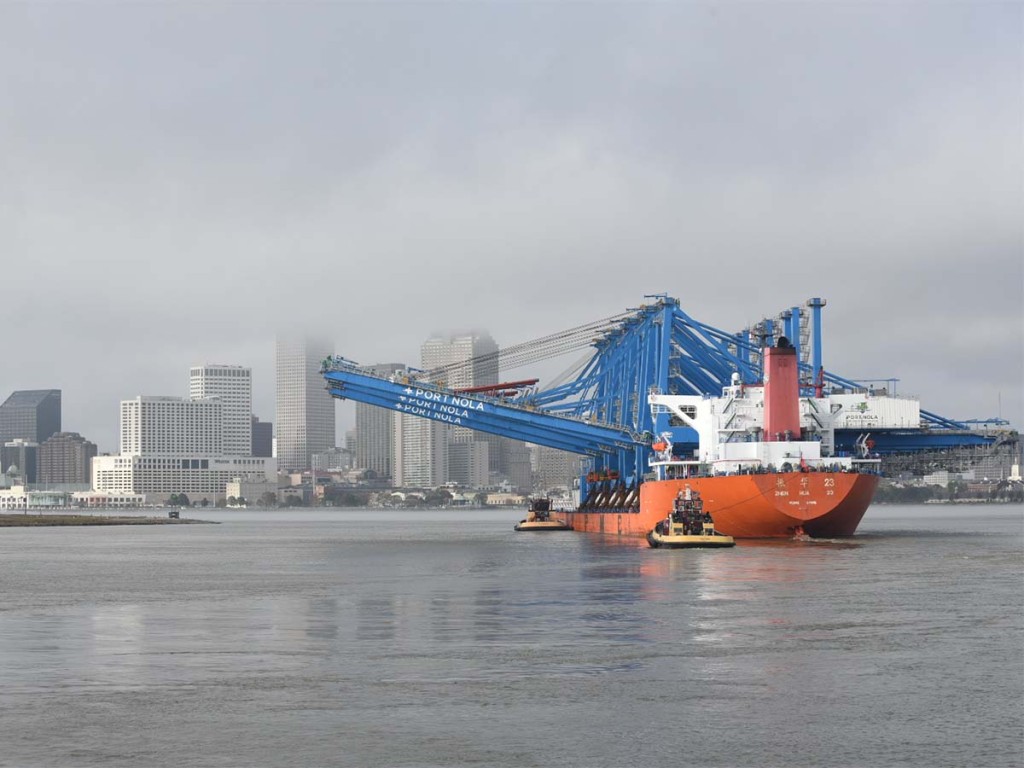 New cranes transiting the Mississippi River this morning as they traveled to the Napoleon Ave. Container Terminal. 