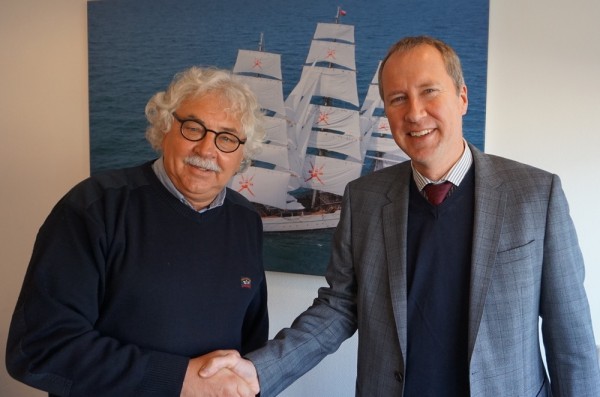 Steef Staal and Wim Knoester shake hands on the merger