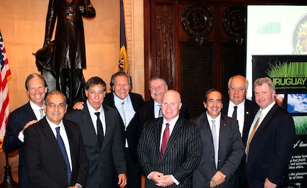 A group of business leaders and high-level government officials from Uruguay and the United States gathered to mark the arrival of the first shipment of frozen boneless lamb from Uruguay into America. Pictured, from left to right, Peter Longstreth, Honorary Consul of Uruguay in the City of Philadelphia; Enzo Benech, Vice Minister, Ministry of Livestock, Fisheries and Agriculture of Uruguay; Edward Avalos, Under Secretary, Regulatory and Marketing, USDA; Luis Almagro, Uruguayan Minister of Foreign Affairs; Ambassador Carlos Pita, Ambassador of Uruguay to the United States; Leo Holt, President of Holt Logistics Corp; Gaston Scayola, Vice President of Frigorifico San Jacinto NIREA; Fernando Perez Abella, Vice President of the National Institute of Meat of Uruguay; and Peter Gilligan, Vice President of Sales and Marketing, The Lamb Co-operative, Inc.