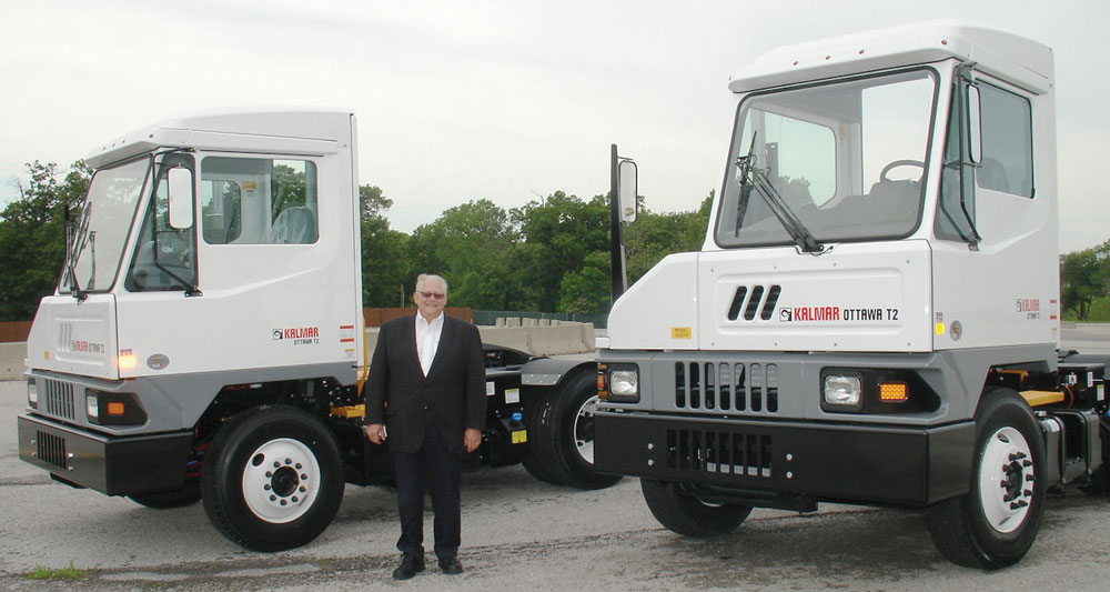 Dave Wood, Kalmar’s vice president for sales and marketing of terminal tractors in the Americas, is mighty proud of the new Kalmar Ottawa T2 terminal tractor. (Photo by Paul Scott Abbott, AJOT)