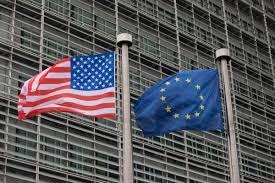 https://www.ajot.com/images/uploads/article/US_EU_flags.jpg