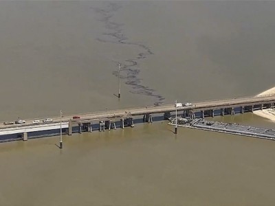 https://www.ajot.com/images/uploads/article/barge_Galveston_bridge.jpg