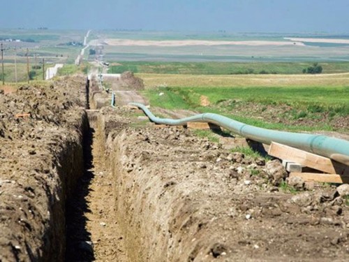 https://www.ajot.com/images/uploads/article/684-can-pipeline-project-hole.jpg