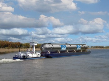https://www.ajot.com/images/uploads/article/Damen_Amur_River_push_boat.jpeg