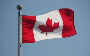 https://www.ajot.com/images/uploads/article/Flag-of-Canada-Vanier-Park.jpg
