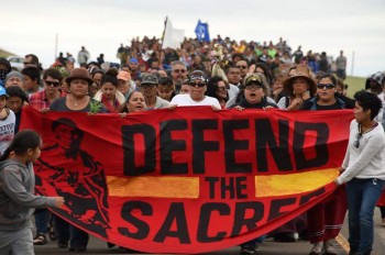 https://www.ajot.com/images/uploads/article/defend-sacred-pipeline-protest.jpeg